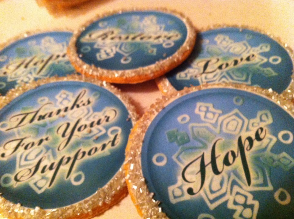 Snowflake cookies with words of support
